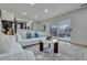 Comfortable living room with sliding glass door access to outdoor deck at 10508 W Chautauga Mtn, Littleton, CO 80127
