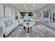 Bright and open living room features a sliding glass door to backyard at 10508 W Chautauga Mtn, Littleton, CO 80127