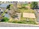 Aerial view of the neighborhood park with basketball and sand volleyball courts at 9759 Lane St, Thornton, CO 80260