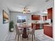 Eat-in kitchen features stainless steel appliances and a dining area at 9759 Lane St, Thornton, CO 80260