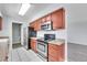 Efficient kitchen with stainless steel appliances and solid countertops at 9759 Lane St, Thornton, CO 80260