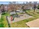 Neighborhood playground with swing set and climbing equipment at 9759 Lane St, Thornton, CO 80260