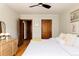 Bedroom featuring hardwood floors, and a glimpse of closet space through the doorway at 1060 N Washington St # 301, Denver, CO 80203