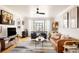 Bright living room with large window, modern furniture, and stylish decor at 1060 N Washington St # 301, Denver, CO 80203