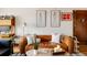 Comfortable living room with stylish seating, decorative lighting, and artistic accents at 1060 N Washington St # 301, Denver, CO 80203
