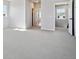 Open bedroom featuring neutral carpet and bright white walls at 13710 Emerald Lake St, Parker, CO 80138
