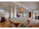 Finished basement featuring a pool table, bar area, and hardwood floors at 32091 Black Widow Dr, Conifer, CO 80433