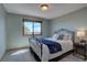 Bedroom with a decorative metal frame bed, natural light and mountain views at 32091 Black Widow Dr, Conifer, CO 80433