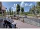 Inviting deck area complete with patio furniture, perfect for outdoor relaxation at 32091 Black Widow Dr, Conifer, CO 80433