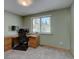 Functional home office with a built in desk and good natural light for remote work at 32091 Black Widow Dr, Conifer, CO 80433