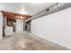 Unfinished basement offering space for storage and utilities at 10784 Allendale Dr, Arvada, CO 80004