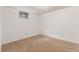This basement room has carpet and a window at 10784 Allendale Dr, Arvada, CO 80004