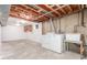 Basement including laundry appliances and utility sink at 10784 Allendale Dr, Arvada, CO 80004