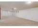 The basement is spacious with carpeting and drop ceiling at 10784 Allendale Dr, Arvada, CO 80004