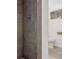 A renovated bathroom featuring a tiled shower and new toilet at 10784 Allendale Dr, Arvada, CO 80004