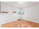Bedroom with window and hardwood floors at 10784 Allendale Dr, Arvada, CO 80004