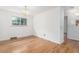 Bright room featuring a decorative chandelier, and wood floors at 10784 Allendale Dr, Arvada, CO 80004
