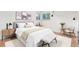 Cozy bedroom with a queen bed, light neutral decor, and natural light at 10784 Allendale Dr, Arvada, CO 80004