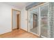 Sunroom with sliding glass door, leading to backyard at 10784 Allendale Dr, Arvada, CO 80004