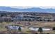 Panoramic aerial view of community showcasing the golf course, ponds, and surrounding cityscape at 178 E 11Th Ave, Broomfield, CO 80020