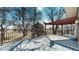 Spacious back deck with steel railings and partially covered sitting area, overlooking a beautiful landscape at 178 E 11Th Ave, Broomfield, CO 80020