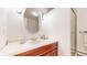 Bathroom with decorative oval mirror, and a glass door shower at 178 E 11Th Ave, Broomfield, CO 80020