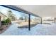 Spacious covered patio featuring a stone walkway and sturdy support beams, ideal for relaxing outdoor gatherings at 178 E 11Th Ave, Broomfield, CO 80020