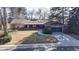 Charming brick home featuring an attached garage and a well-maintained front yard with mature trees at 178 E 11Th Ave, Broomfield, CO 80020