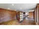 Room boasts exposed brick walls and stylish parquet flooring, exuding vintage charm at 178 E 11Th Ave, Broomfield, CO 80020