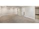Finished basement featuring carpeted floors and paneled doors at 10158 E Fair Cir, Englewood, CO 80111