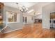 Inviting living room with hardwood floors, fireplace and lots of natural light at 10158 E Fair Cir, Englewood, CO 80111