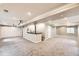 Spacious basement with recessed lighting, projector, and built-in cabinets at 11895 Hitching Post Ct, Parker, CO 80134