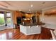 Spacious kitchen with granite countertops, stainless steel appliances, and hardwood flooring at 11895 Hitching Post Ct, Parker, CO 80134