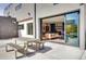 Open-concept design seamlessly connects the backyard dining area to the home's interior at 3910 Reed St, Wheat Ridge, CO 80033