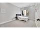 Simple bedroom with natural light from a bright window and minimalist decor at 3910 Reed St, Wheat Ridge, CO 80033