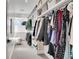 Spacious walk-in closet with ample shelving and hanging space for organized storage at 3910 Reed St, Wheat Ridge, CO 80033