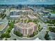 Stunning aerial view of the building showcasing the surrounding cityscape on a sunny day at 4875 S Monaco St # 303, Denver, CO 80237