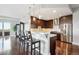 Kitchen with stainless appliances and breakfast bar that opens to the living space at 4875 S Monaco St # 303, Denver, CO 80237