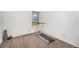 Home exercise room featuring a treadmill and window at 8746 Carr Loop, Arvada, CO 80005