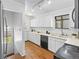 Functional kitchen with ample cabinet space, hardwood floors, and a convenient layout at 1987 S Downing St, Denver, CO 80210