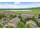 Scenic aerial view of the well-maintained townhome community and nearby park at 12919 W Burgundy Dr, Littleton, CO 80127