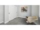 Bedroom with neutral colors, carpeted floors, closet and a modern chair at 1286 Raleigh St, Denver, CO 80204