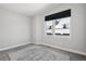 Neutral bedroom with a large window providing natural light at 1286 Raleigh St, Denver, CO 80204