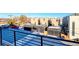 See the modern garage of these residences from this balcony view with neighborhood scenery in the background at 1286 Raleigh St, Denver, CO 80204