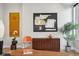 Chic living room showcasing stylish furniture, artistic details, and hardwood flooring at 1286 Raleigh St, Denver, CO 80204