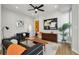 Bright living room features modern decor, comfortable seating, and plenty of natural light at 1286 Raleigh St, Denver, CO 80204