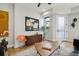 Comfortable living area features wood floors, stylish decor, and ample natural light at 1286 Raleigh St, Denver, CO 80204