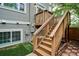 Exterior stairway leading to a deck, showcasing well-maintained features and access to outdoor living at 1441 S Ulster St, Denver, CO 80231