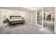 Finished basement bedroom with recessed lighting and comfortable carpet at 1640 Harrison St, Denver, CO 80206