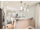 Modern kitchen with granite countertops, stainless steel appliances, and ample cabinet space at 1640 Harrison St, Denver, CO 80206